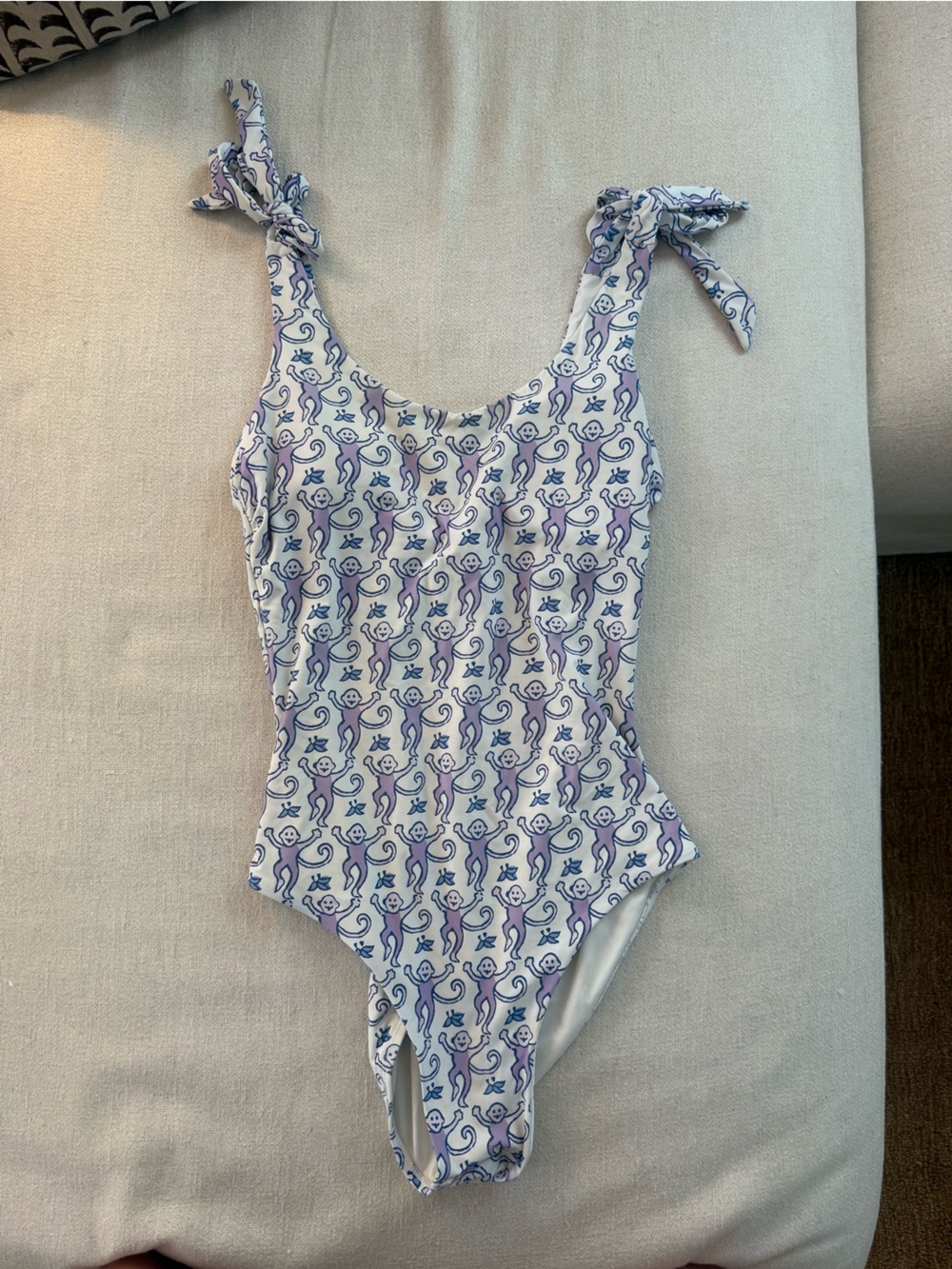 women’s One-Piece Swimsuit in White with Purple monkey Pattern - roller rabbit